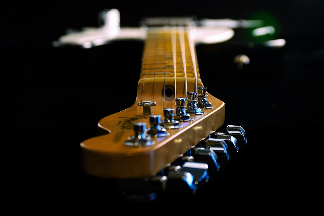 Guitar headstock showing the tuning pegs