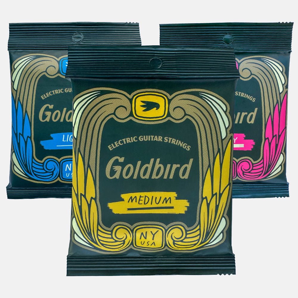 Goldbird electric guitar strings. Light, Medium, and Heavy sets front packaging bundle shot.