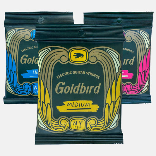 Goldbird electric guitar strings. Light, Medium, and Heavy sets front packaging bundle shot.